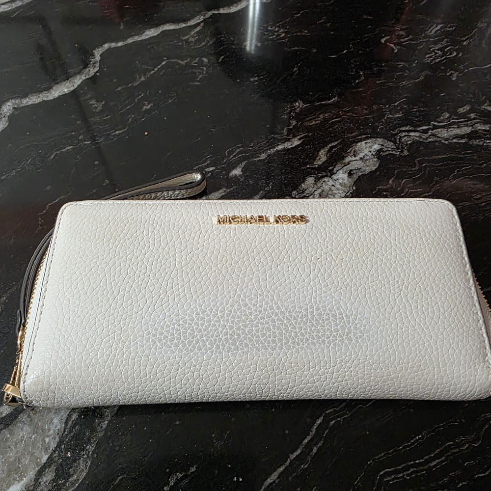 Michael Kors White Leather Wallet.  Wallet Does Have Some Discoloration.